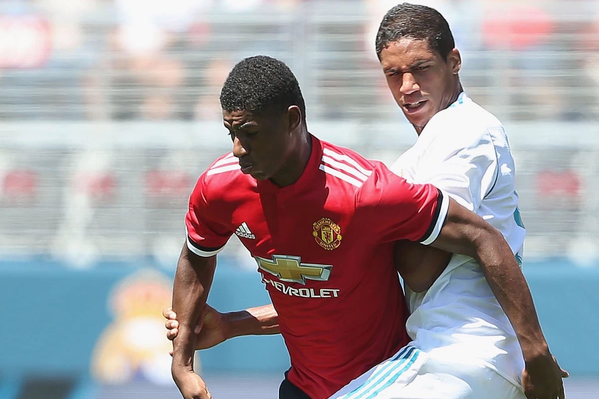 កីឡាករ Marcus Rashford និង Raphael Varane