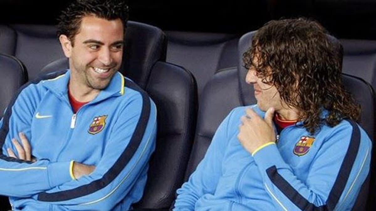 Xavi និង​ Puyol