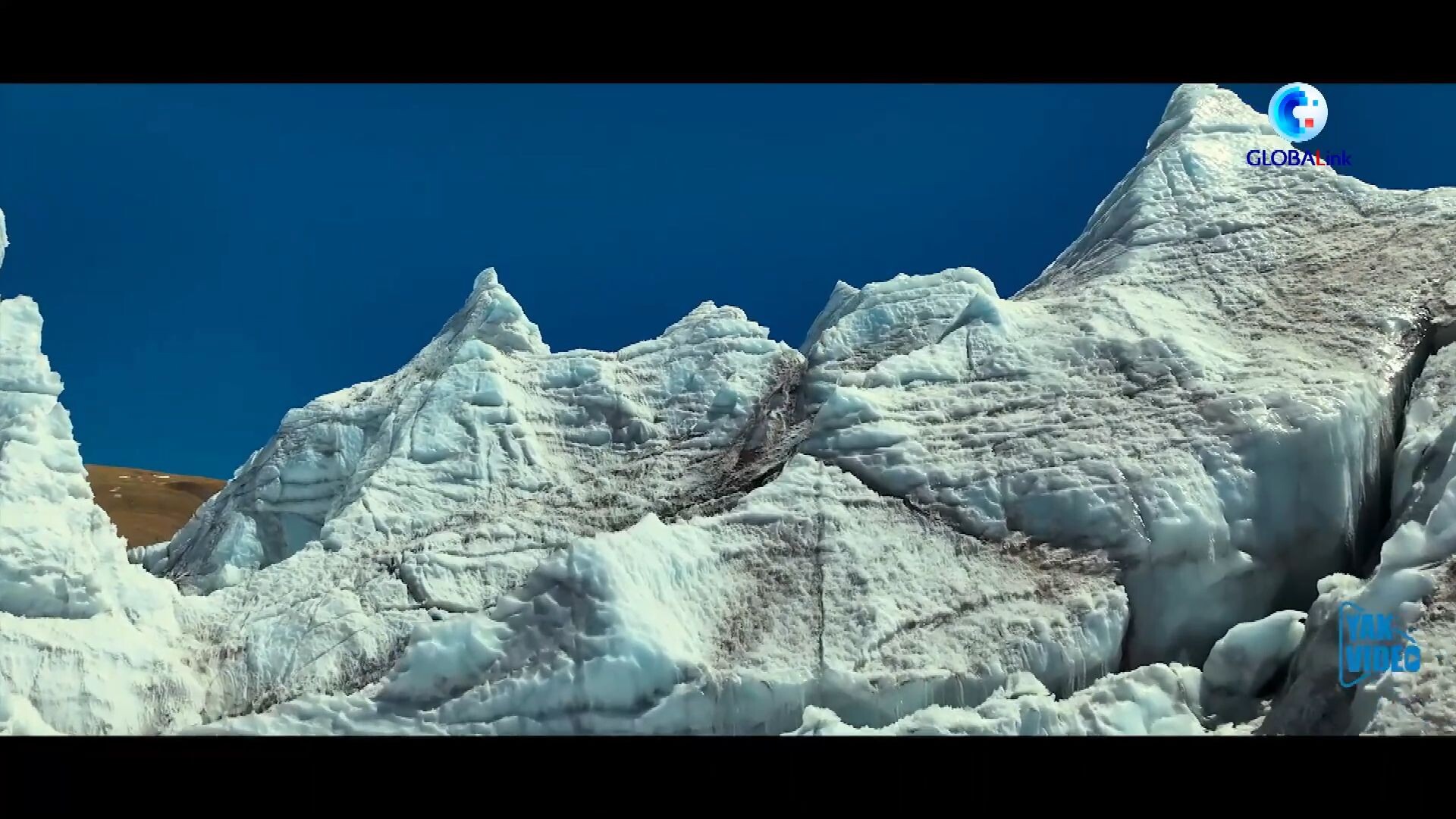 GLOBALink : โดรนบินโฉบพาชม 'ธารน้ำแข็งกั่งปู้' ระยะประชิดในทิเบต