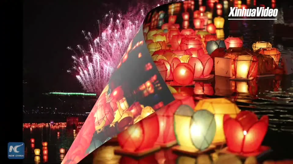 'โคมไฟ' นับหมื่นลอยล่องกลางแม่น้ำ รับเทศกาลในกว่างซี